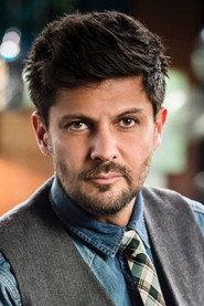 Fabián Robles as Julián Garza in La Troca de Sinaloa 2005