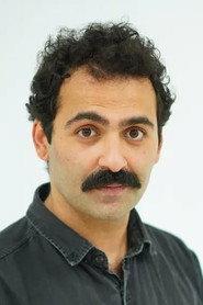 Fırat Bozan as Hikmet in One of Those Days When Hemme Dies 2024