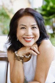 Minh Trang as Bửu Hường in Trapped 1990