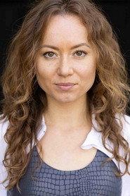 Anastasia Chernaya as Stewardess Sharon in Wives of the Skies 2020