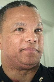 Marlon McClain as Police Officer in Dueling Dragons 2017