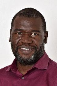 Patrick Oketch as Afundi in The Lion Standing in the Wind 2015
