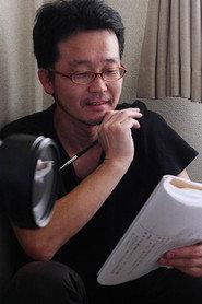 Toshirō Enomoto as Enomoto in Groper Train: A Married Couple Groping Together 1995