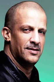 Abdelkarim Brahmi-Benalla as L'arabe chez Woo in District 13: Ultimatum 2009
