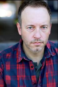 Gene Loveland as Mike Norris in Revenge 2013