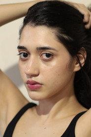 Sofia Martins as Girl in the Elevator in The Cameras at Palmer Building 2026