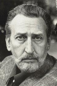 Kay E. Kuter as Proctor in Warlock 1989