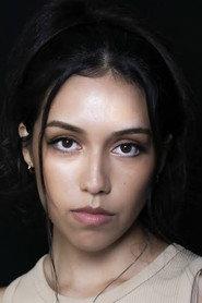 Kirsten Henriquez as Luminosa (Lumi) in Monochromatic 2026