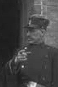 Jan Grader as Politieagent in Pro Domo 1918