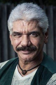 Jackson Antunes as Palhaço Romeu/Que Engana ("Vidente") in O Auto da Boa Mentira 2021