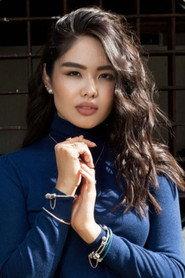 Indira Edilbayeva as Aydana in Almost Macho 2022