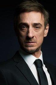 Bojan Dimitrijević as Policajac-novajlija / Rookie Cop in Zone of the Dead 2011