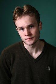 Patrick Sharn as The Wizard in Wicked of Oz 2026