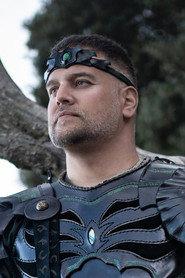 Sylvain Meunier as Titan in NOOB - Seigneur de guerre 2025