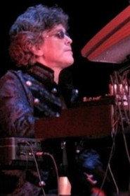 Guy LeBlanc as Leading keyboards, vocals in Camel: In From the Cold 2014
