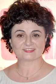 Béatrice de Staël as L'épicière in Jacky in the Kingdom of Women 2014