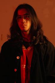 Chanon Dahan as Radio Voice in Passage 2024