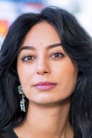 Kaoutar Harchi as Mother in After the Fire 2023
