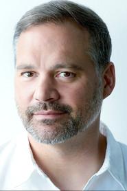 Don W. Shepherd as Ellis in Catch Me If You Claus 2023