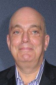 John Mainieri as Hans Kopechne in Cayman Went 2009