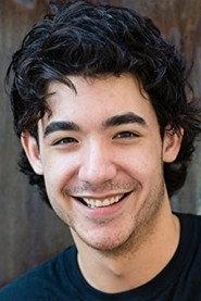 Stephen Wu as Kurt in How to Kill Your Family On Christmas