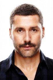 Orhan Kılıç as Ekrem in Kum Zambağı 2024