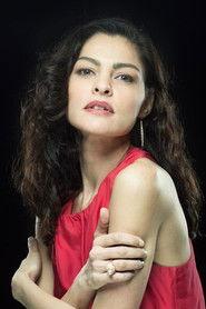 Sarah Shahin as The Mysterious Man Assistant in El ott 2014