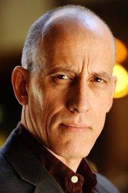 Alex Fernandez as Detective Ambrozik in Christmas Crime Story 2017