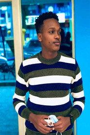 AERSENE MUTSINZI PRINCE as KENNY (DRIVER) in THE SILENT PURSUIT 2024