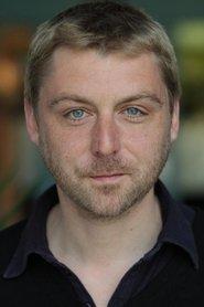 Alexandre Carrière as Ossart in Next Time I'll Aim for the Heart 2014
