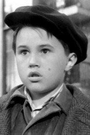 Yuri Myasnikov as Seryozha Davydov in childhood in The House I Live In 1957