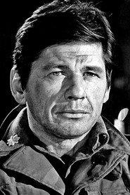 Charles Bronson as Nick Colton in Breakout 1975