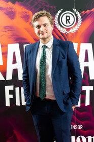 Ryan J. Smith as News Reporter in Arthur's Empire 