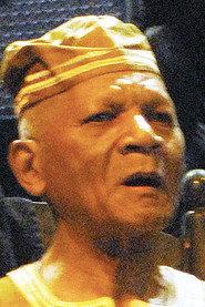 Baba Oje as Mr. Johnson in The Common Denominators