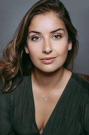 Tess Atkins as Michelle Swensen in Sweet Revenge: A Hannah Swensen Mystery 2021