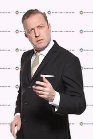 Indy Neidell as The TV Host in The Dream Machine 2023