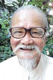Nguyễn Hữu Thành as Dinh, Kim's Father in Buffalo Boy 2004