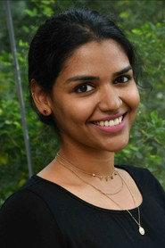 Teju Belawadi as Manu in Asmin