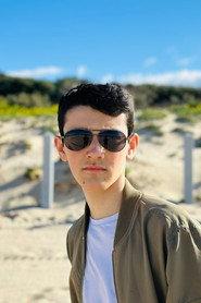 Cosmo Cinquetti as The Mime, the Fisherman, Party Member in Catching the Big Fish 2025