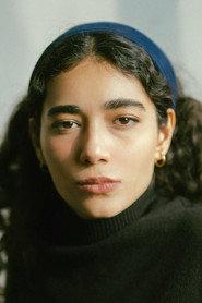 Razieh Mansouri as Elham in Careless Crime 2021