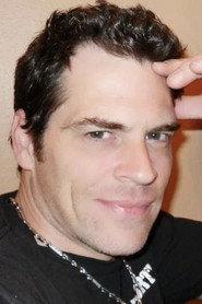 Gene Lythgow as Gene Wilson in Cartel War 2012