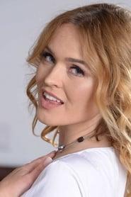 Krissy Lynn as Anita (archive footage) in Sorority Sisters from Space 2023