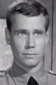 John Kelland as Sgt. Young in The Beast in the Cellar 1971