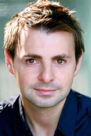 John Hasler as Thomas / Rheneas (voice) in Thomas & Friends: Tales from the Rails 2017