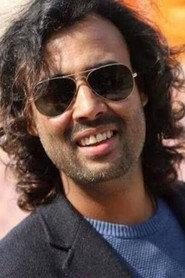 Satya Raj Acharya as Bhakta Raj Acharya in Acharya 2011