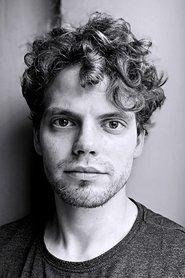 Jędrzej Wielecki as Pistetajros/seller in Nothing About You Scares Me 2025