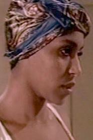 Samantha Starr as Youma in The Black Peacock 1975