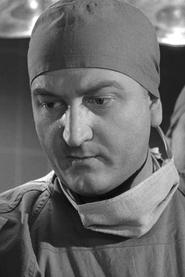 Stuart Nisbet as Dr. Claymore in Your Three Minutes Are Up 1973