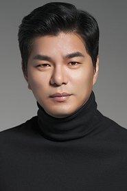 Choi Min-chul as Coach Nam Gi-cheol in Iron Mask 2023