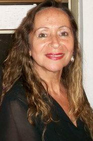 Eva Lima as Dona Elvira (The crazy neighbor) in I Remember 2006